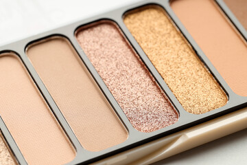 One beautiful eyeshadow palette on table, closeup
