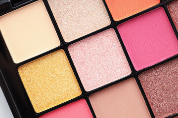 Beautiful eyeshadow palette as background, top view