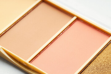 Beautiful eyeshadow palette on white background, closeup