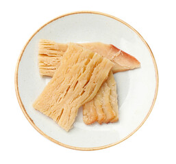 Pieces of tasty dried squid isolated on white, top view
