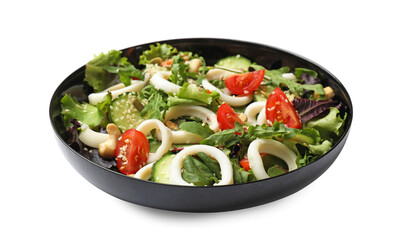 Delicious salad with squid rings, vegetables and nuts isolated on white