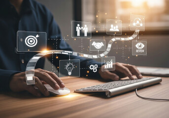 A business concept illustration showing a person using a computer mouse and keyboard on a wooden desk, with a futuristic digital overlay