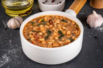 One pot Marry Me Butter Beans with white beans, Sun-Dried Tomatoes, spinach, garlic, hard cream and seasonings, fall season american comfort food, vegan healthy dinner rich in plant-based protein