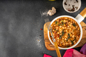 One pot Marry Me Butter Beans with white beans, Sun-Dried Tomatoes, spinach, garlic, hard cream and seasonings, fall season american comfort food, vegan healthy dinner rich in plant-based protein