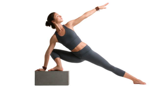 Woman practicing yoga pose with block, white isolated background