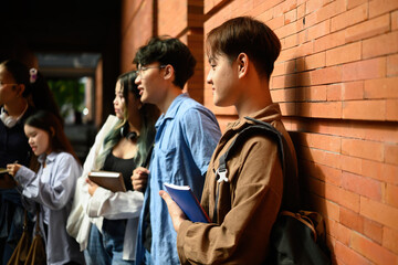 Focuses on LGBT university student surrounded by a group of friends having a fun conversation, and the concept of accepting gender identity in an open college society