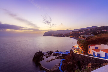Coastal view near Sao Martinho in Madeira at blue hour just after sunset.