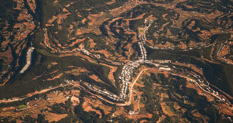 Surrounding Areas Of Santai County, China. View From Airplane Window On Landscape Of China. Porthole View Or Called Bull's-eye Window. Aerial View On Fields And Forests. Dense Private Buildings. Many