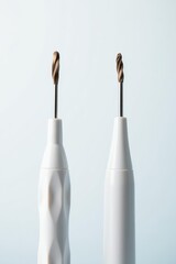 Pair of dental drills, close-up, pure white backdrop , bright, low speed drill