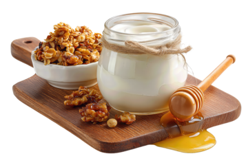 Breakfast set with yogurt jar, granola dish, and honey dipper on acacia board, isolated on transparent background.

