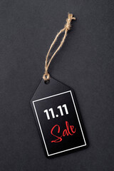 11.11 single day sale concept. Black tag on black background