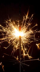 Bright sparks radiating from a burning stick against a dark background