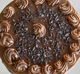 close up of a chocolate cake and crumbles