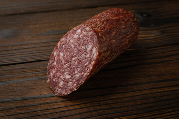 Close-Up of Sliced Salami on Rustic Wooden Table - Food Photography