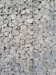 Grey stones in Gabion Wall, Baskets, wire fence filled with stones