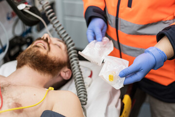 Close up of injured men in an Ambulance. High quality photo