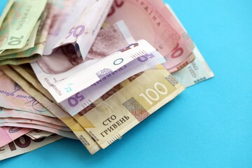 Big amount of different Ukrainian hryvnia money bills. Pile of crumpled ukrainian banknotes