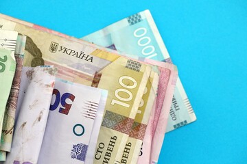 Big amount of different Ukrainian hryvnia money bills. Pile of crumpled ukrainian banknotes
