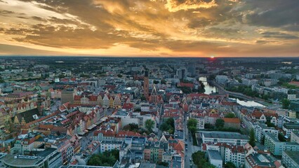 Golden Hour Aerial Panorama of Wrocław Old Town with Market Square, Historic Tenement Houses and Gothic Architecture in the Heart of Poland