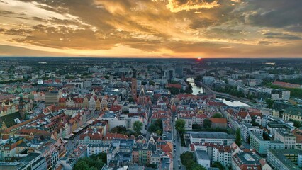 Golden Hour Aerial Panorama of Wrocław Old Town with Market Square, Historic Tenement Houses and Gothic Architecture in the Heart of Poland