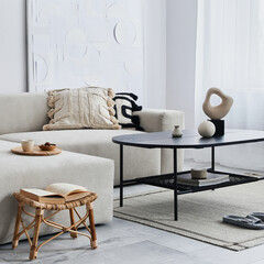 Domestic interior of living room with design modular sofa, black coffee table, lamp, decoration,...