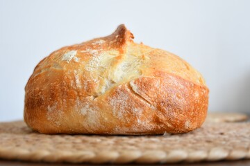 loaf of bread on wooden table