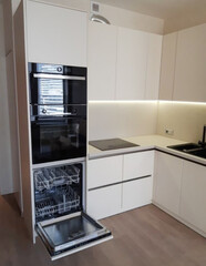 Sleek minimalist kitchen revels in Scandinavian harmony, ideal for Hygge gatherings and...