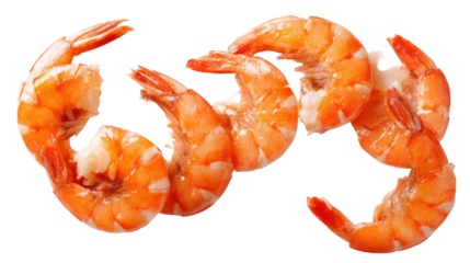 Several cooked shrimp arranged artfully on a black background