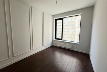 A serene, sunlit room with minimalist panels whispers of tranquility, perfect for Day of Silence or Feng Shui reflection