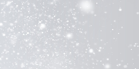 Abstract Silver winter snow fall Background with white lights, snow is dancing randomly on the background,  Abstract bokeh defocus glitter or winter morning snow fall background.
