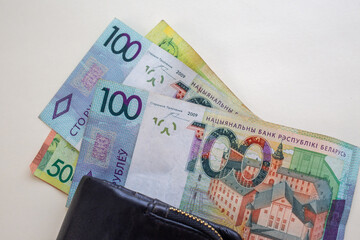 Belarusian ruble banknotes sticking out of wallet