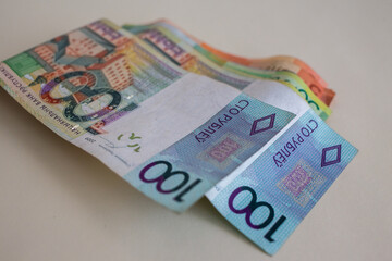 Belarusian ruble banknotes spread on surface