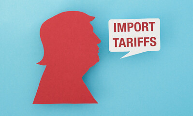 Import Tariffs text and a paper cutout of Trump's head on a blue background