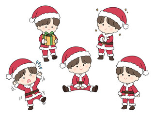 サンタのコスチュームを着た可愛い男の子のセット