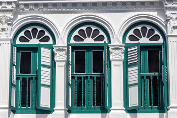 Beautiful window with green and white color of  heritage building in Singapore.