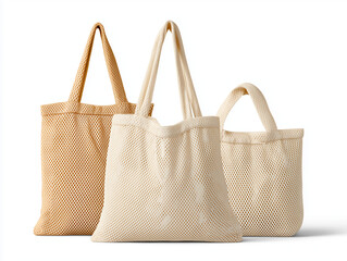 Set of Three Reusable Cotton Mesh Produce Bags Isolated on White Background