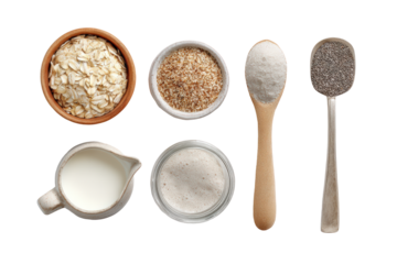Overhead view of oatmeal, chia seeds, flax seeds, sugar, and milk in bowls and spoons isolated on transparent background