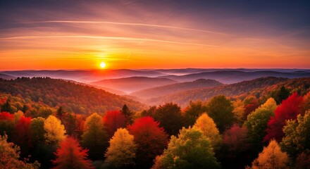 Naklejka premium Autumn sunrise over mountainous forest
