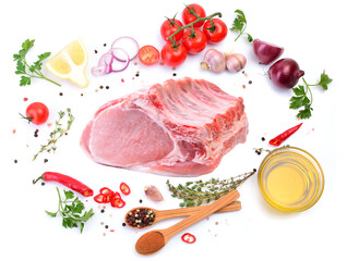 Fresh pork meat steak spices and vegetables on a white background