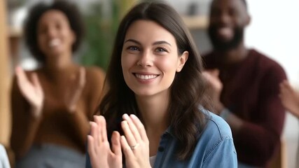 A therapy support group applauding a participant hands clapping with warm smiles participants seated in a safe circle under soft lighting atmosphere symbolizing sobriety