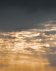 Luminous sky at sunset with soft clouds and magical light