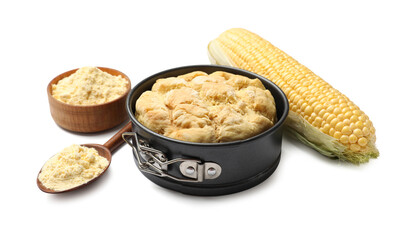 Freshly baked cornbread loaf, flour and cob isolated on white