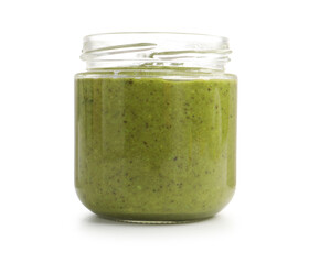 Fresh pesto sauce in jar isolated on white