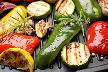 Pan with grilled vegetables and spices, closeup