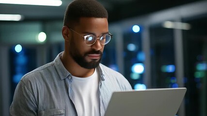 A technician in a server room checking data security laptop open with coding interface visible glowing servers reflecting on glasses atmosphere symbolizing cybersecurity - Powered by Adobe