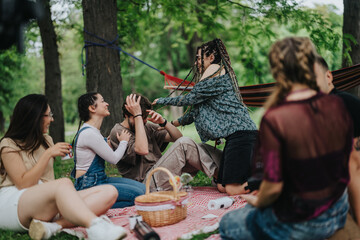 A group of young friends socializing and playing together, enjoying the outdoors during a picnic in a lush green park. Perfect depiction of youthful energy, camaraderie, and nature's beauty.