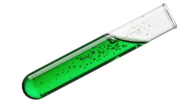 Glowing green liquid in laboratory test tube chemical experiment science discovery