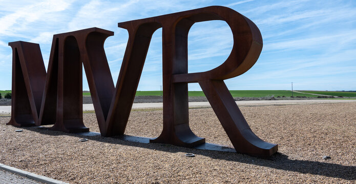 Puras, Spain - 25 March 2025: MVR Metal Letters in Rural Landscape