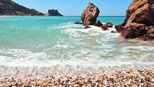 Peeble beach on greece, Turquoise water