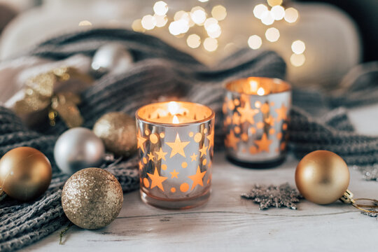 New Year and Christmas decor with garland and candles. - Powered by Adobe